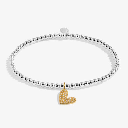Silver bracelet with yellow gold heart set with CZ stones