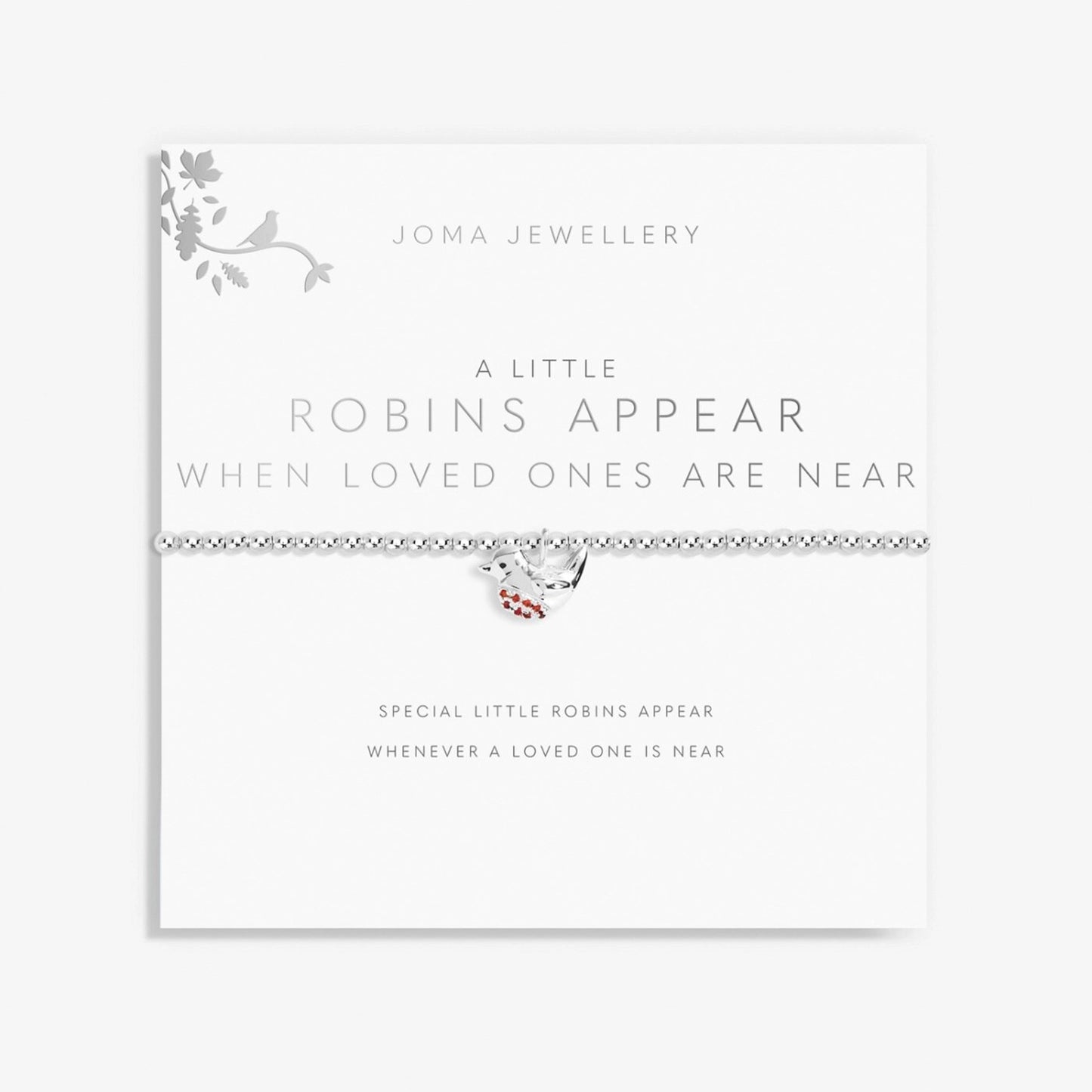 Joma silver beaded bracelet with little robin charm set with red CZ stones on a sentiment card