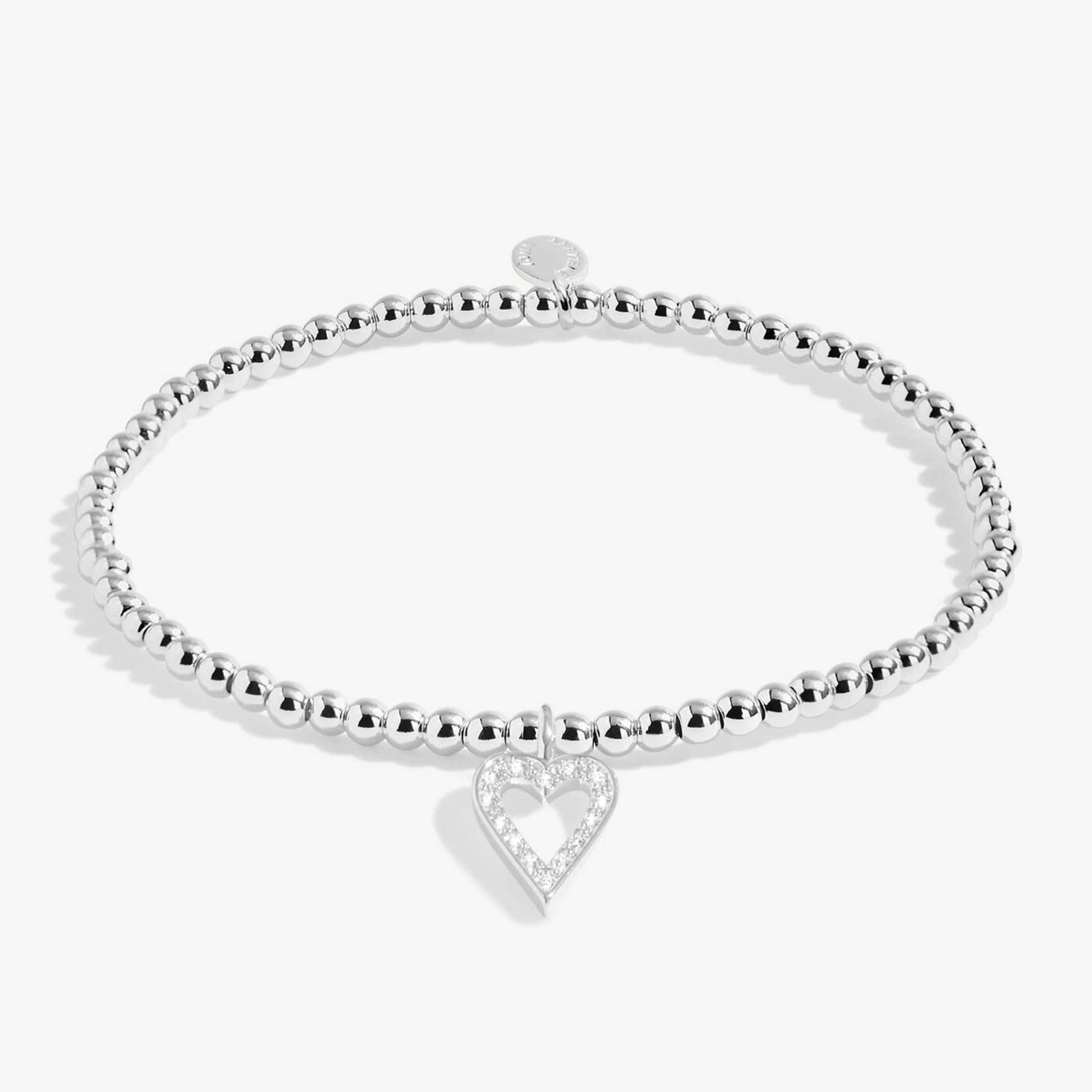 Silver beaded bracelet with open heart charm set with CZ stones