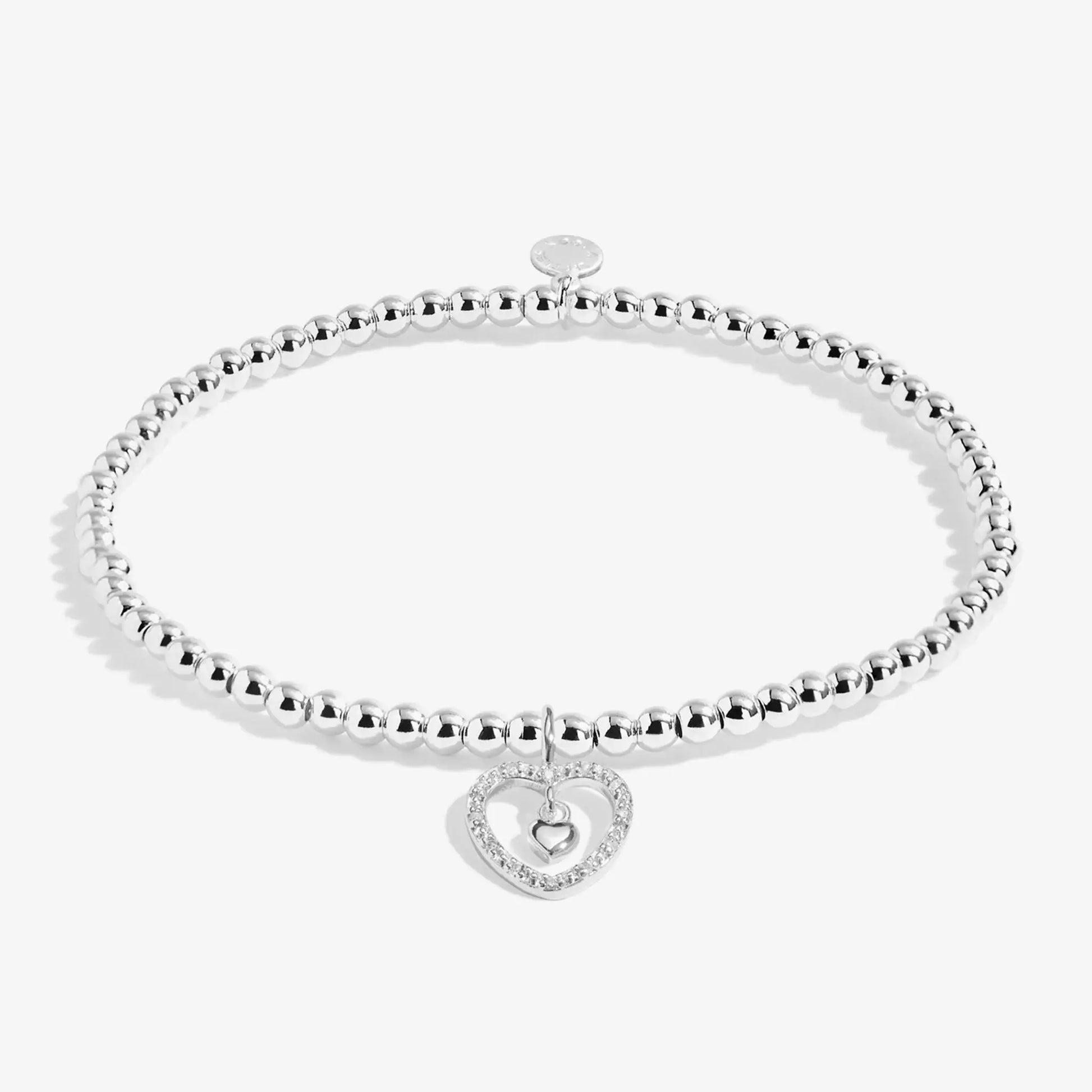 Silver beaded bracelet with CZ set heart frame and dangling tiny heart