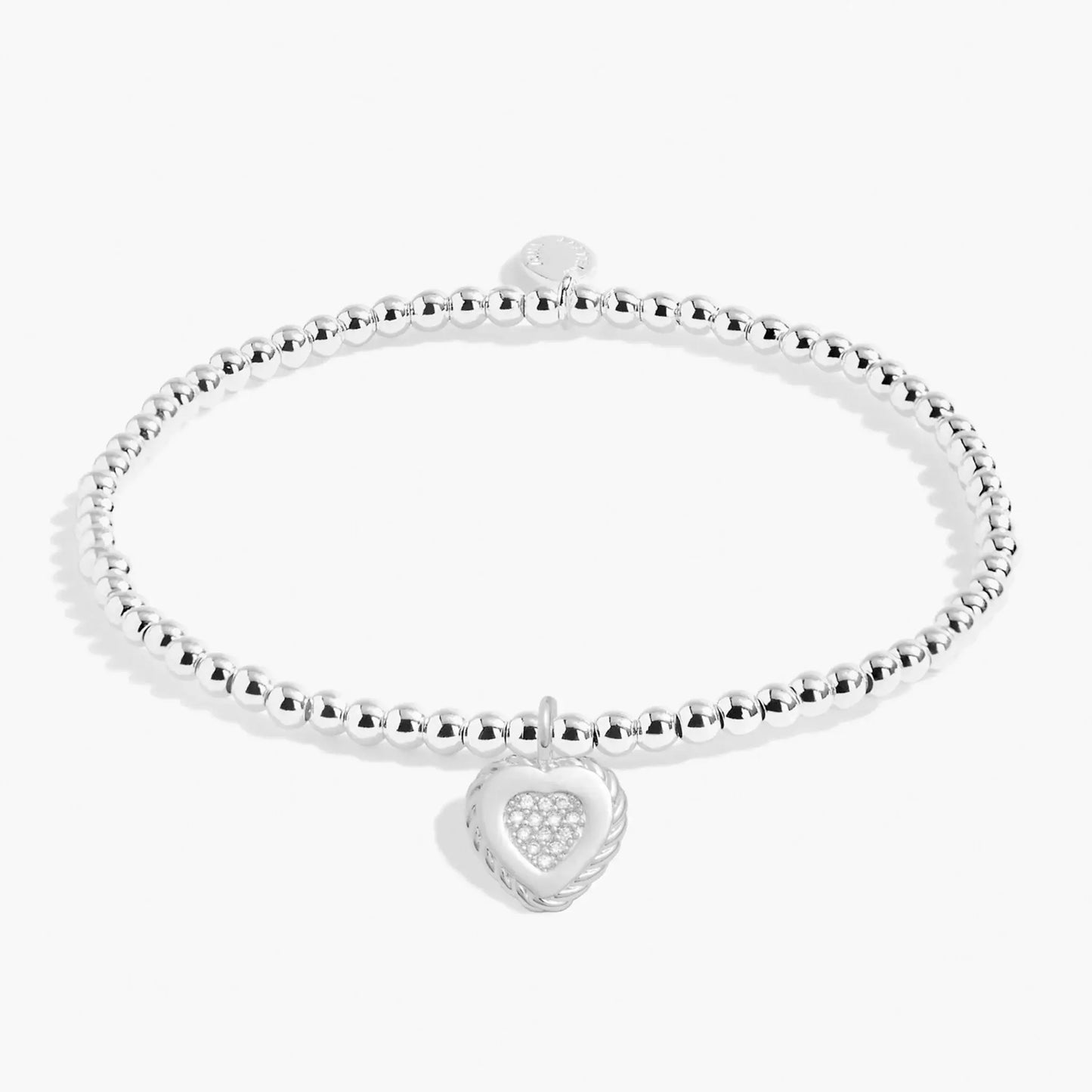 Silver beaded bracelet with twist frame heart charm inset with CZ stones