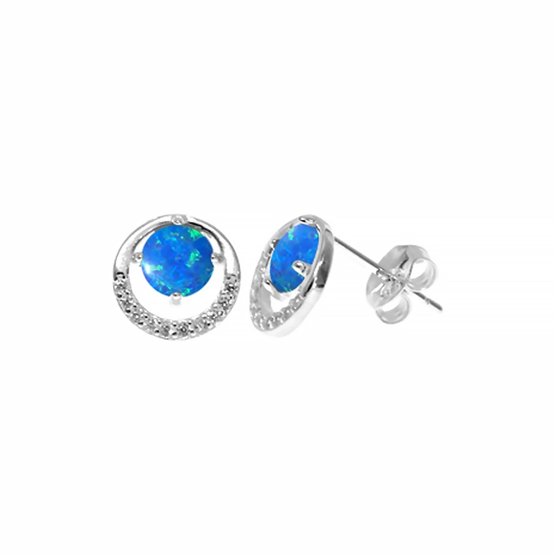 Round silver stud earrings with a ring of CZ stones and a bright blue synthetic opal in the centre