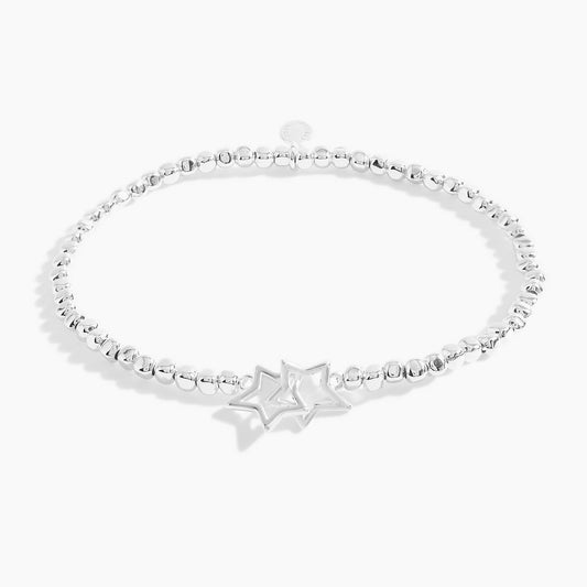 A silver beaded bracelet with silver interlinking circles