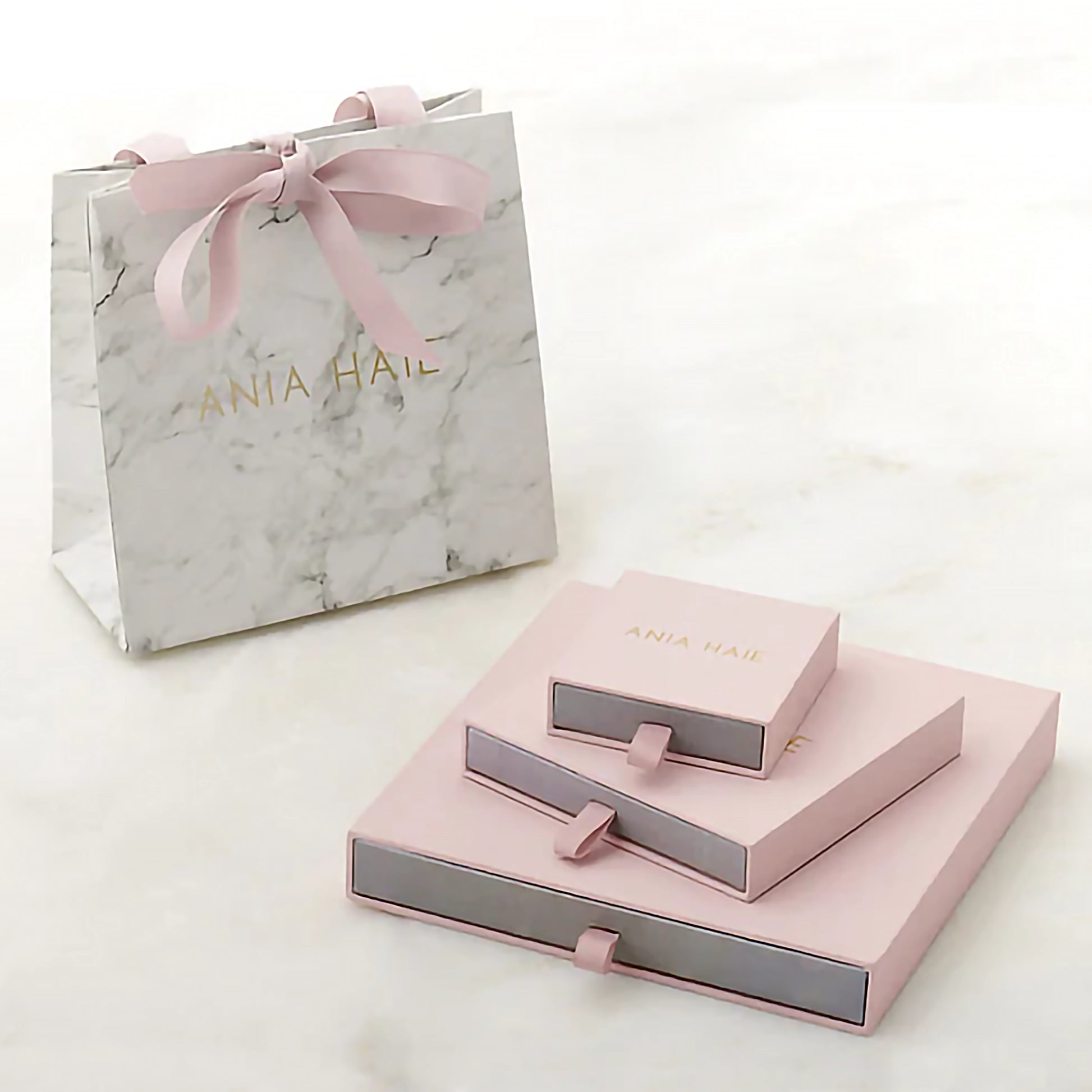 Ania Haie packaging with marble pattern bag