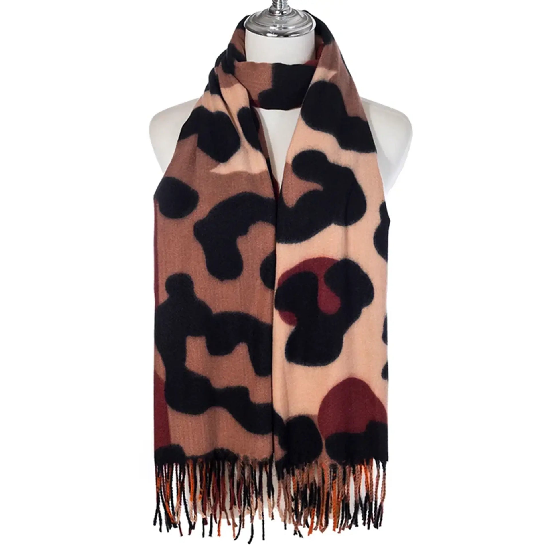 Animal print scarf in natural colours with tassel trim