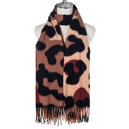 Animal print scarf in natural colours with tassel trim