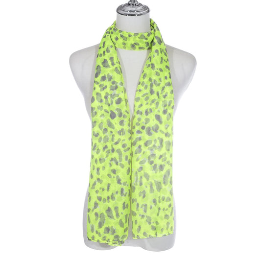 A bright neon green scarf with grey animal print pattern