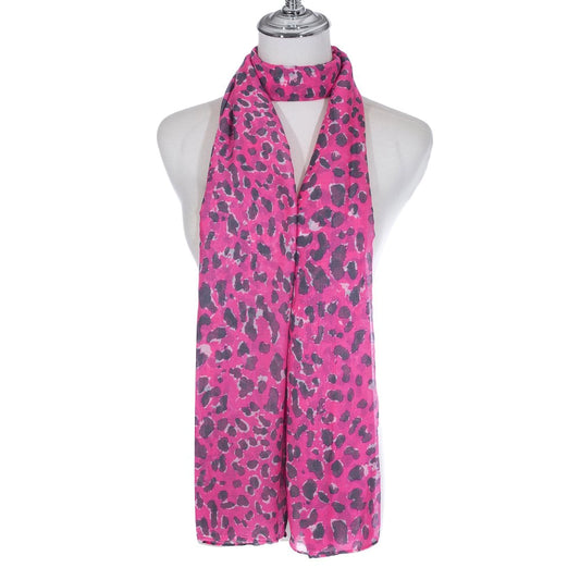 A pink scarf with an animal print pattern