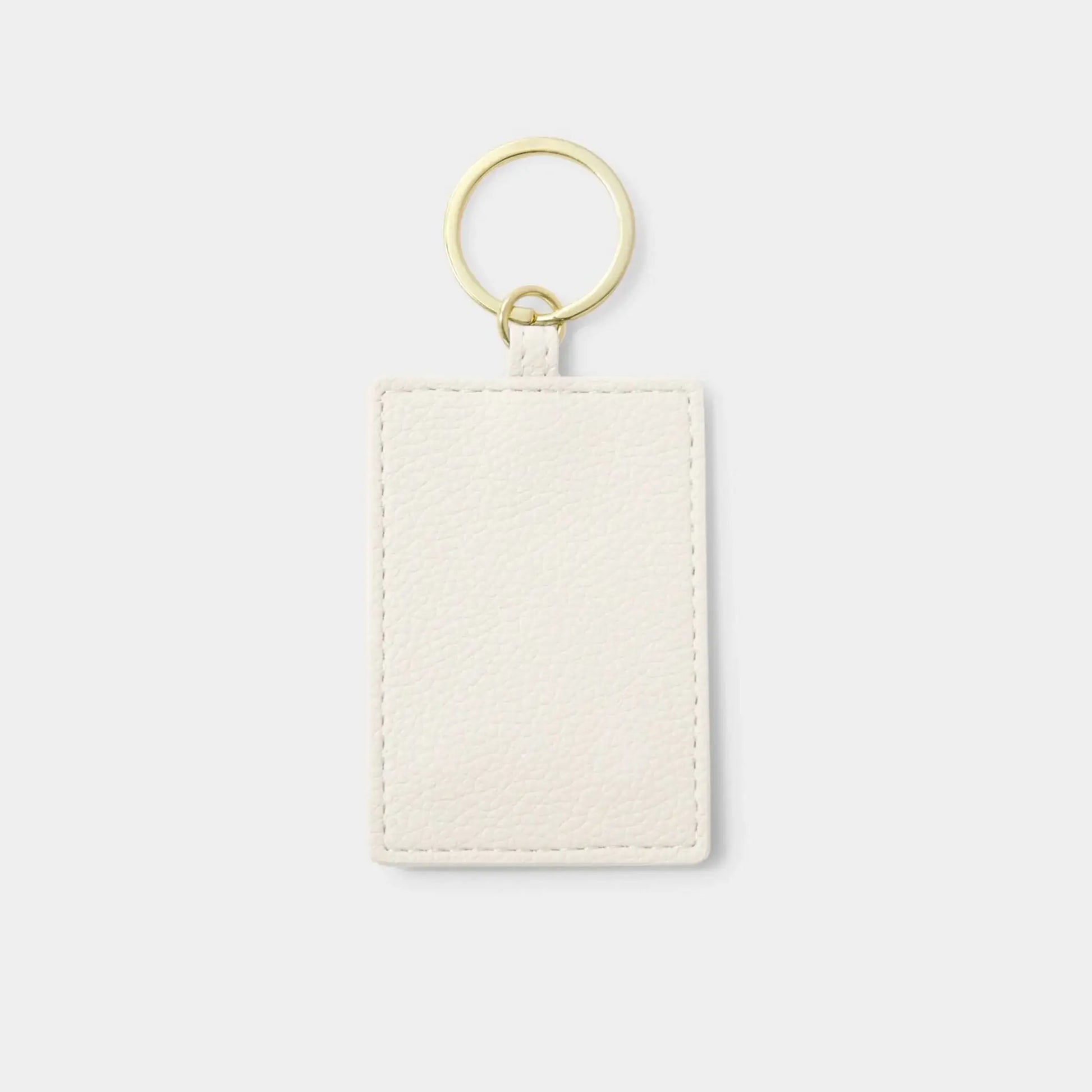 White faux leather keyring back