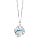 Silver round pendant with icy blue enamel in the centre like water and silver circles to represent floating glaciers