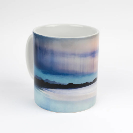 A mug featuring artwork by Cath Waters in blue, pink and purple