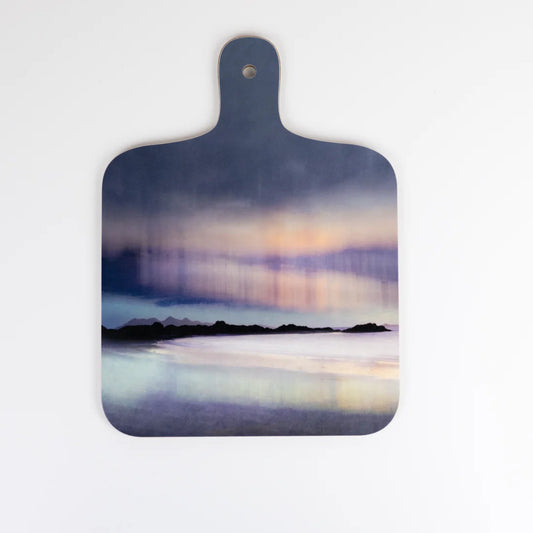 A paddle shaped chopping board featuring Aurora artwork by Cath Waters