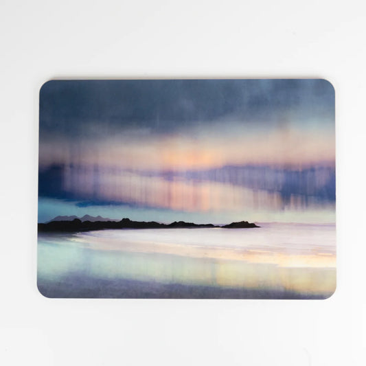 A tablemat featuring an aurora artwork by Cath Waters in blues, pinks and purples