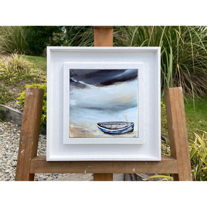 A ceramic tile printed with an abstract painting of a boat on a shoreline mounted on a white frame