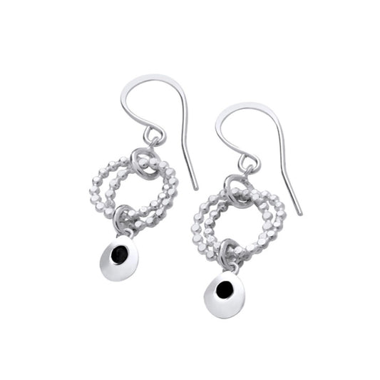 Silver earrings featuring two rings of circles and a dangling silver teardrops