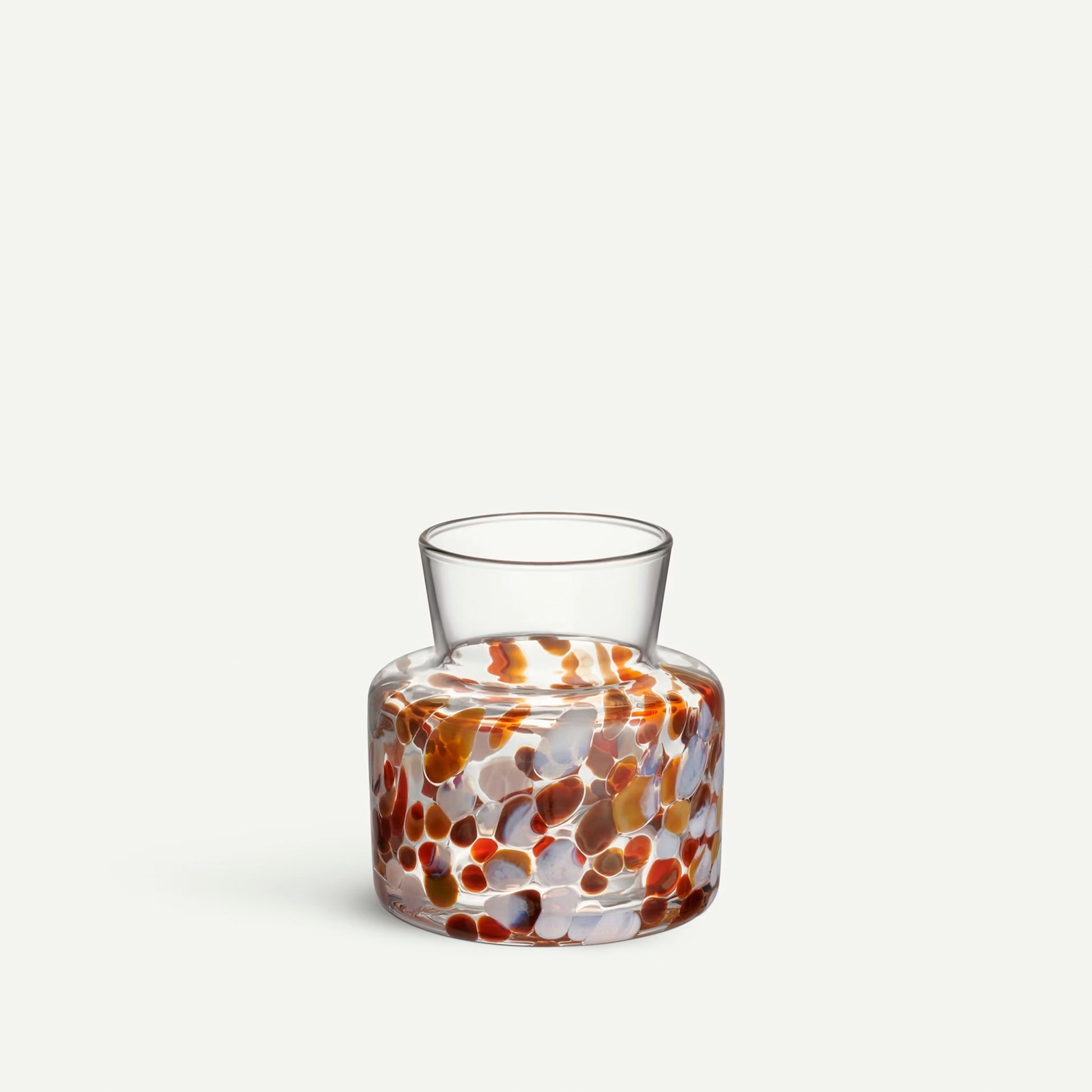 Glass vase with brown and white pebble details 