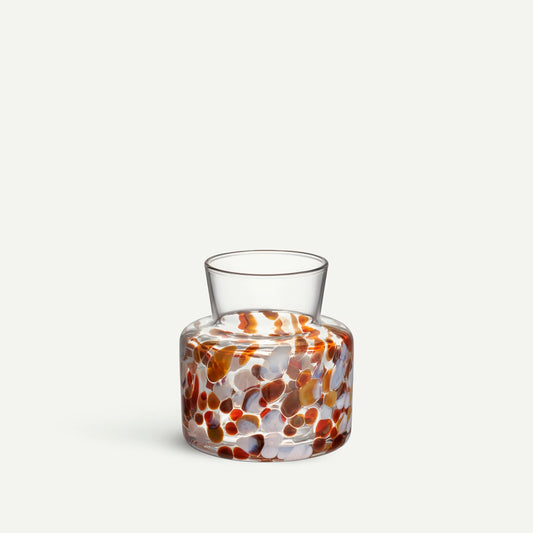 Glass vase with brown and white pebble details 