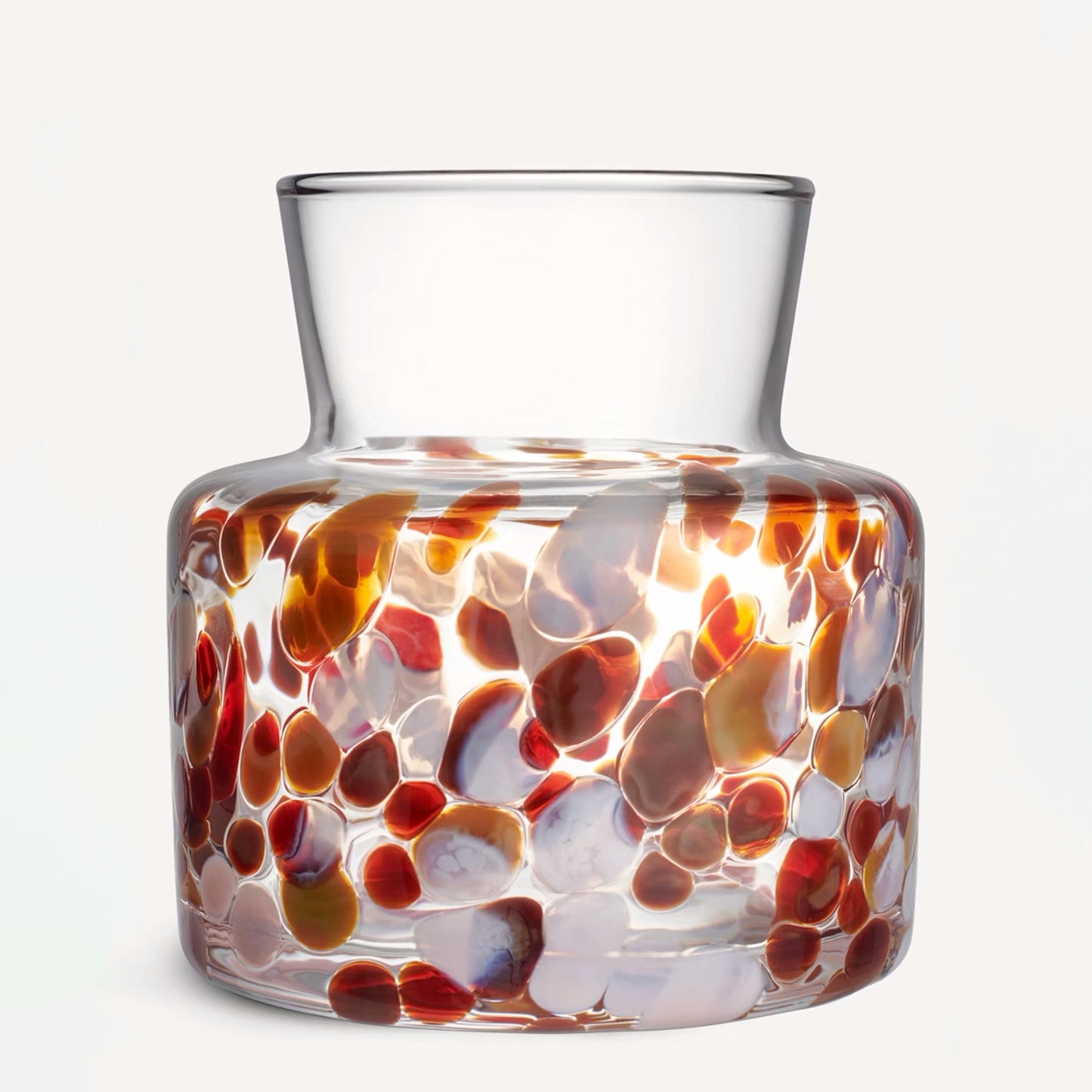 Glass vase with brown and white pebble details 