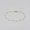 A yellow gold chain bracelet with little round ball details