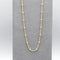 A yellow gold chain necklace with little round ball details