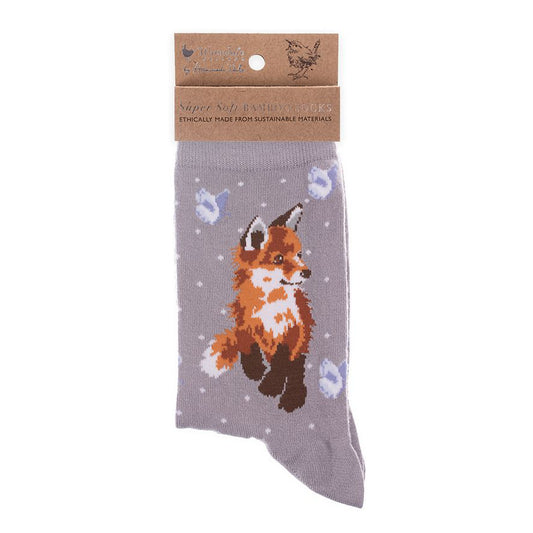 Folded pair of warm grey socks with a little baby fox cub picture and white polka dots