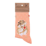 Folded pair of pink socks with a hamster and jam filled biscuits picture and white polka dots