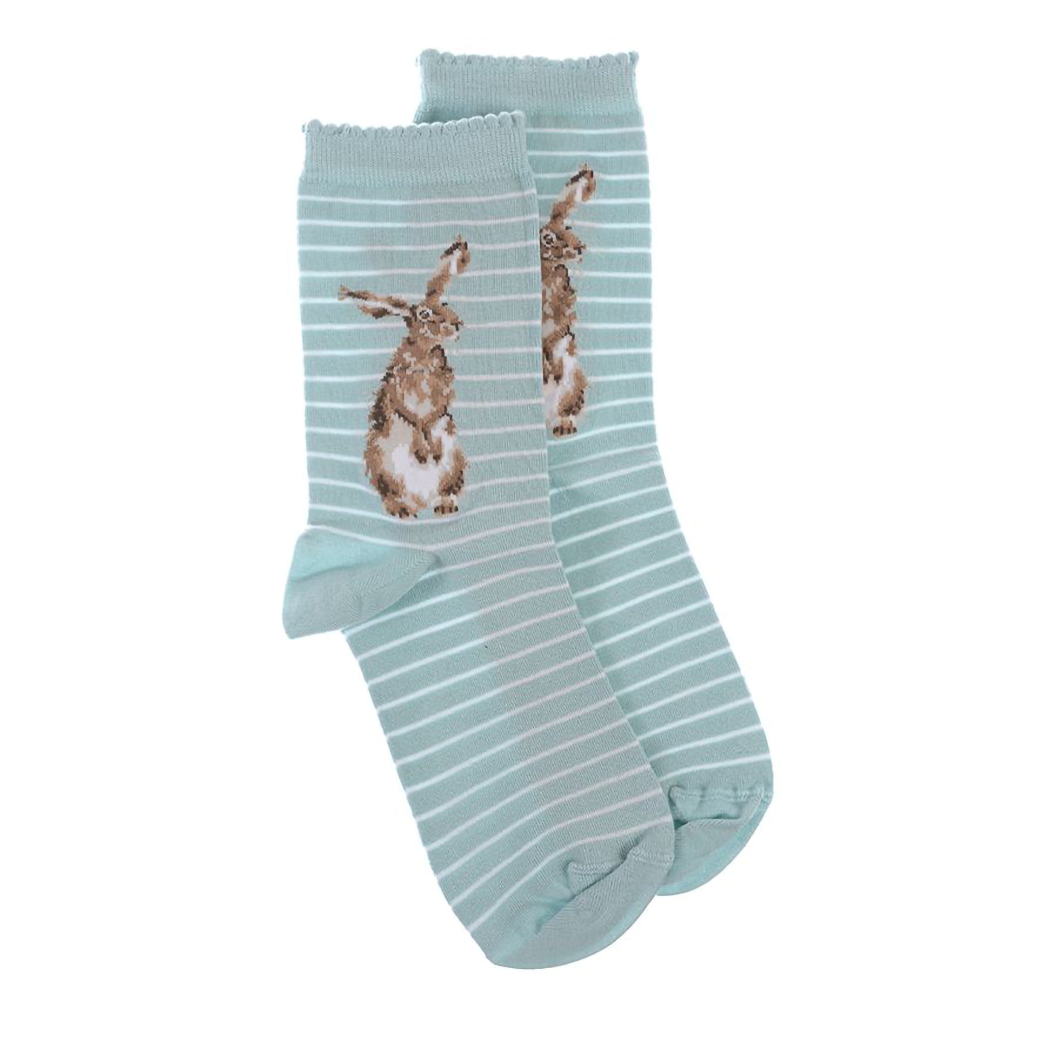 A pair of light duck egg blue socks with a hare picture and white stripes and frilly edges