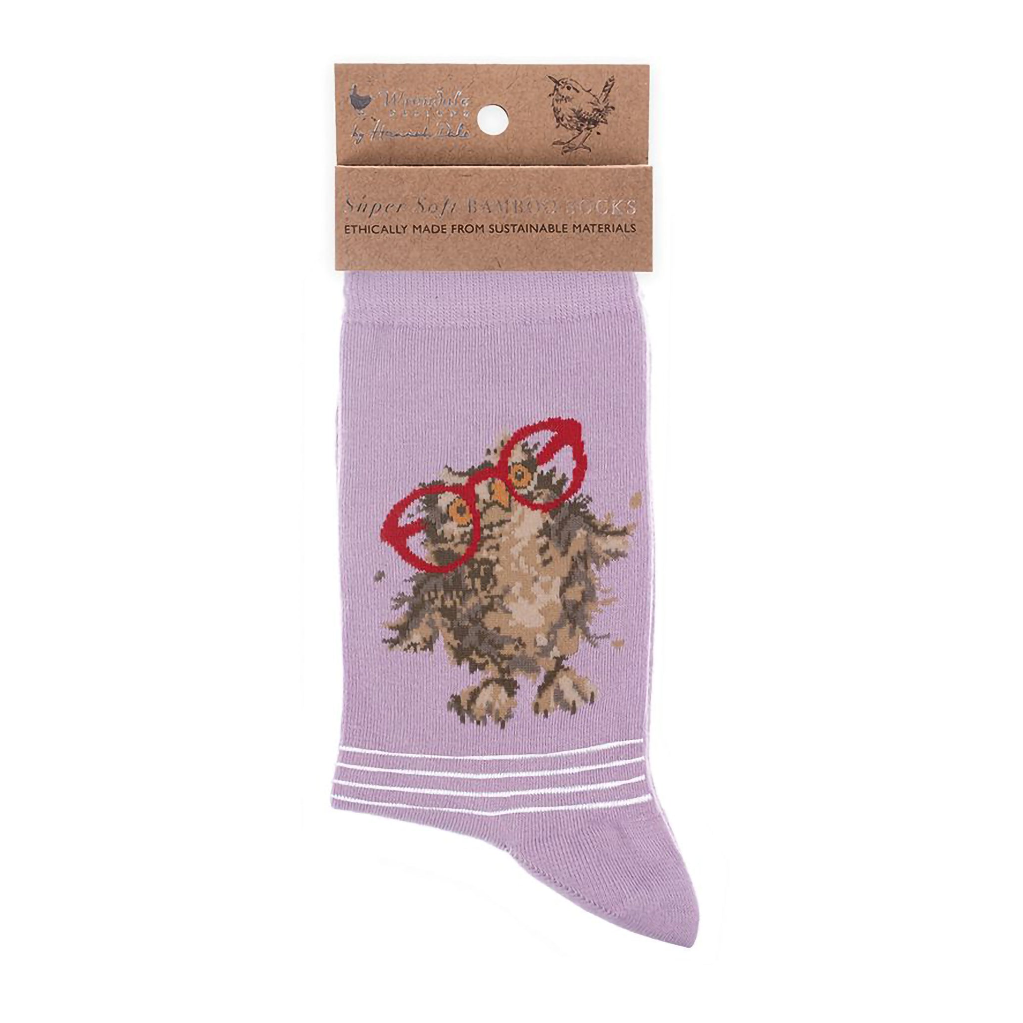 Folded pair of lilac purple socks with a owl with red glasses picture and white stripes