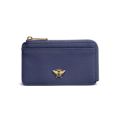 Navy blue faux leather purse with bee emblem and zip closure