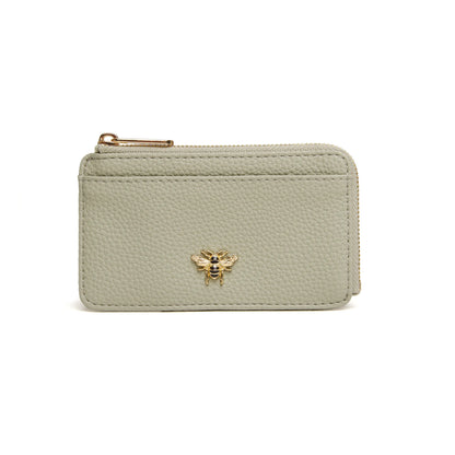 Pistachio green faux leather purse with bee emblem and zip closure