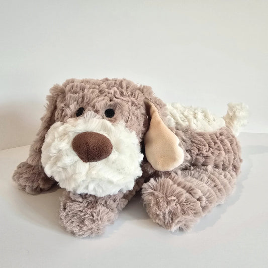 Plush beige dog toy with microwavable flax-seed head bag insert