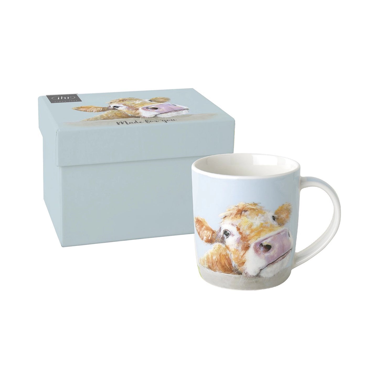 Light blue porcelain mug with curious cow design