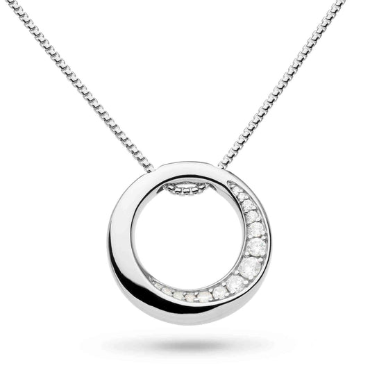 A bevelled open circle silver pendant with white cubic zirconia stones