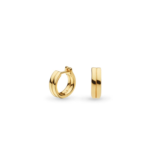 A pair of gold huggie hoop earrings with hinge