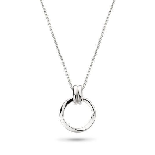 A silver pendant on chain featuring a large hoop