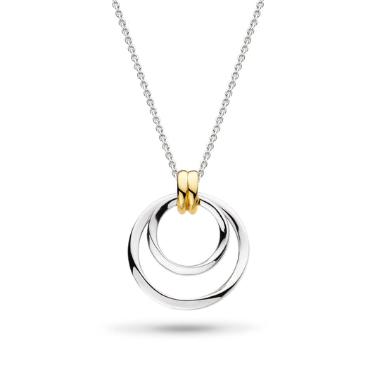 A silver pendant featuring two golden hoops with two silver loops threaded through