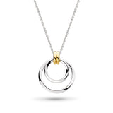 A silver pendant featuring two golden hoops with two silver loops threaded through