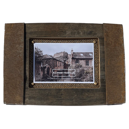 A horizontal photo frame with barrel hoop details and Harris Tweed