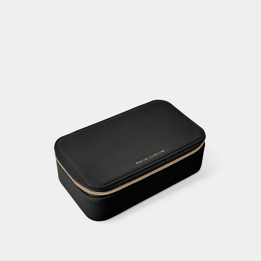 A small zipped up jewellery box in black and leather look fabric