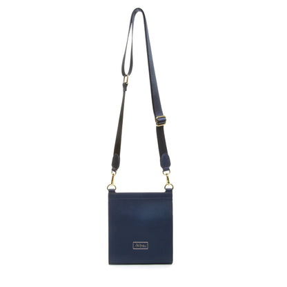 Navy blue faux leather crossbody bag with adjustable canvas strap