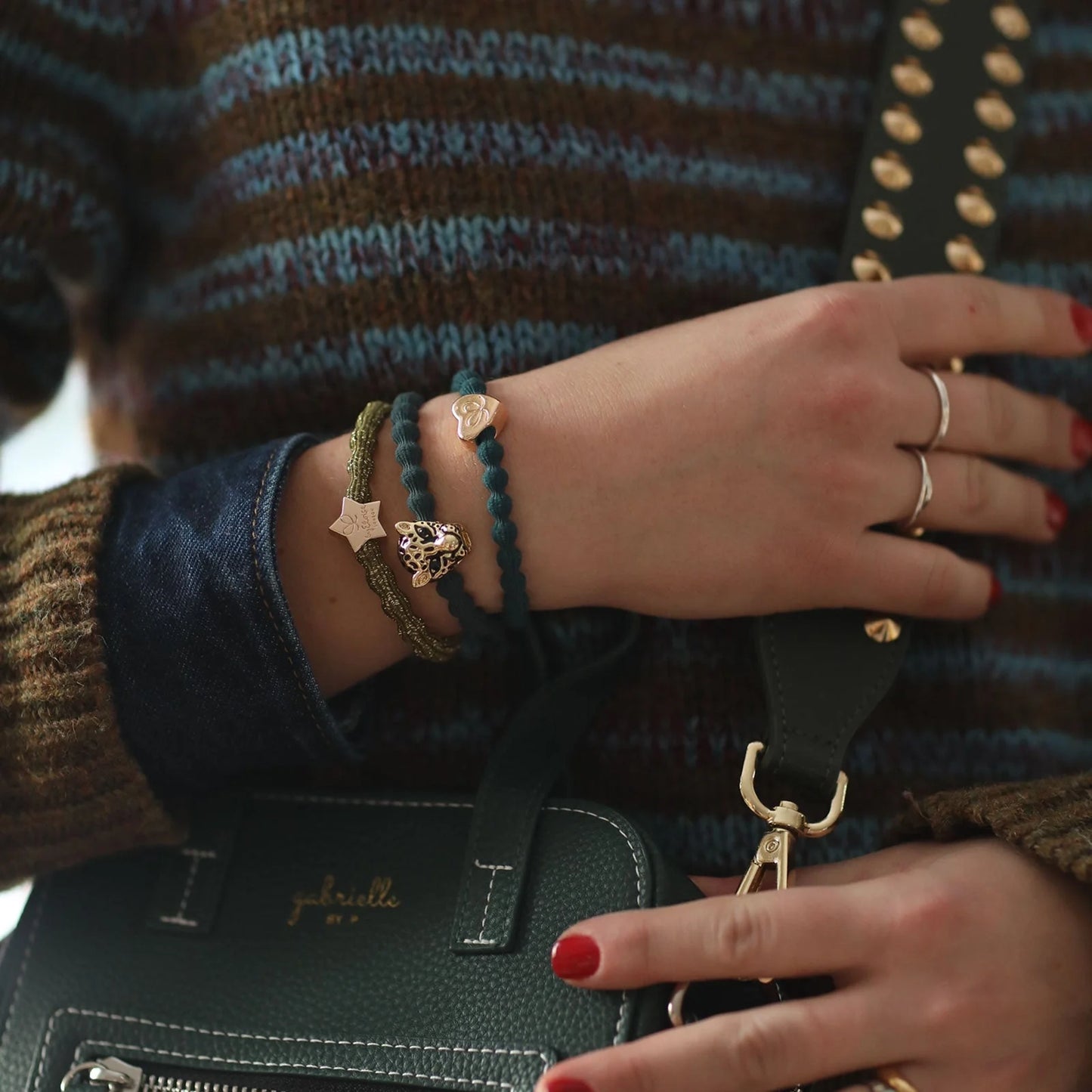 Model wearing hair ties as bangle accessories
