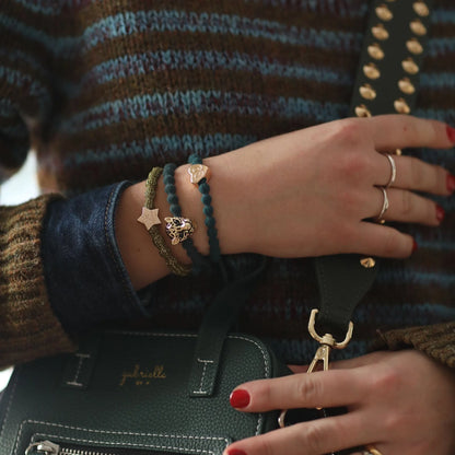 Model wearing hair ties as bangle accessories