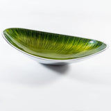 A long boat shaped bowl in silver aluminium with green enamelled centre