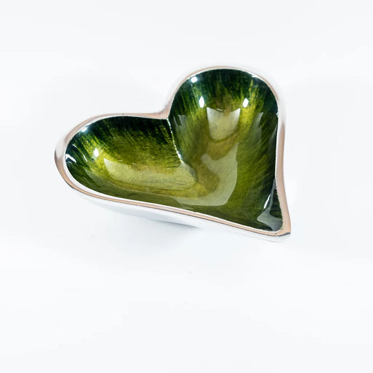 A silver aluminium heart shaped dish with green ombre enamel inside