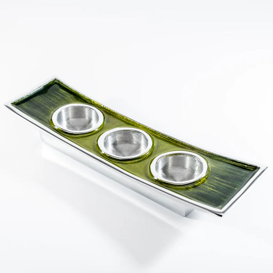 A long rectangular aluminium triple tealight candle holder with green enamel