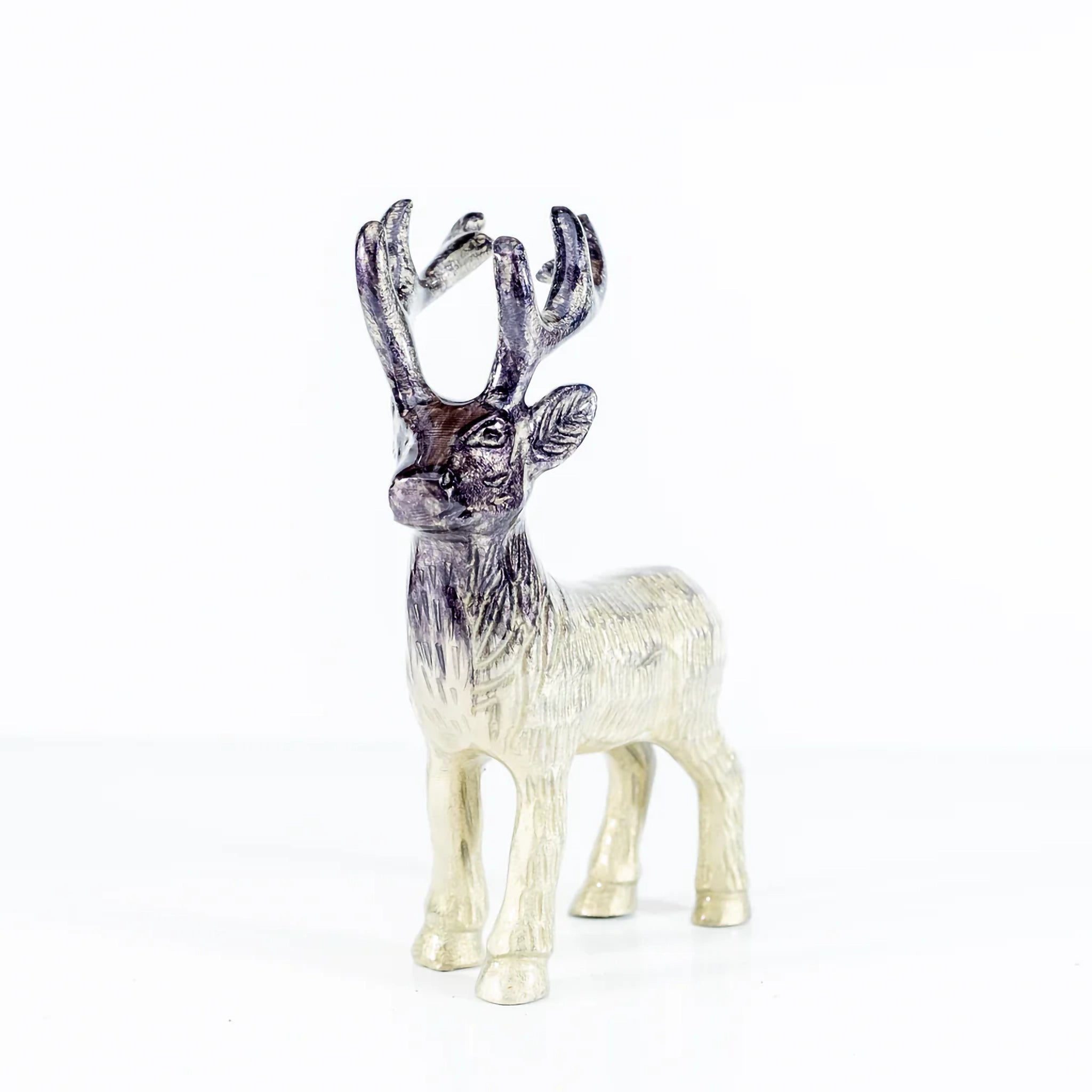 Face view of brushed silver coloured Highland stag sculpture with etched details