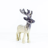 A brushed silver coloured Highland stag sculpture with etched details from front