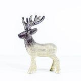 A brushed silver coloured Highland stag sculpture with etched details