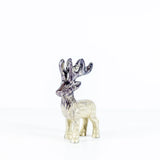 A brushed silver coloured Highland stag sculpture with etched details left side