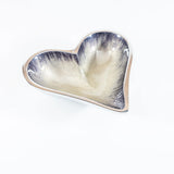 A silver aluminium heart shaped dish with silver ombre enamel inside